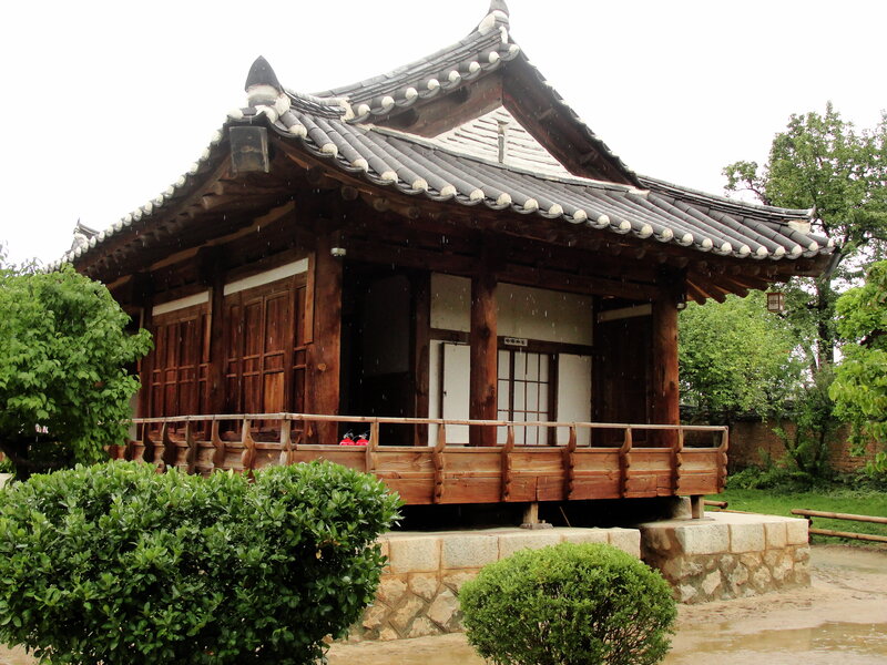 Traditional Korean pavilion in rain