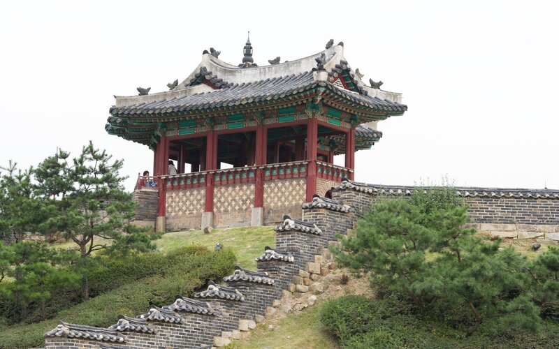 Traditional Korean pavilion on hill