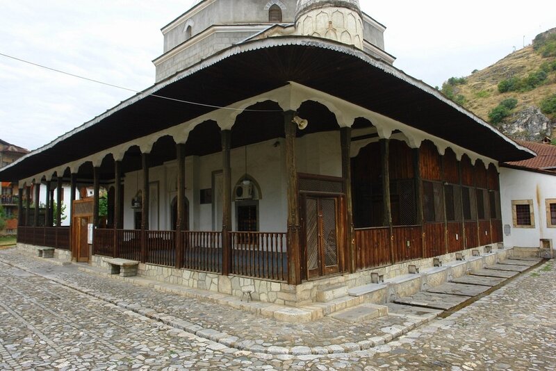 traditional mosque with wooden porch