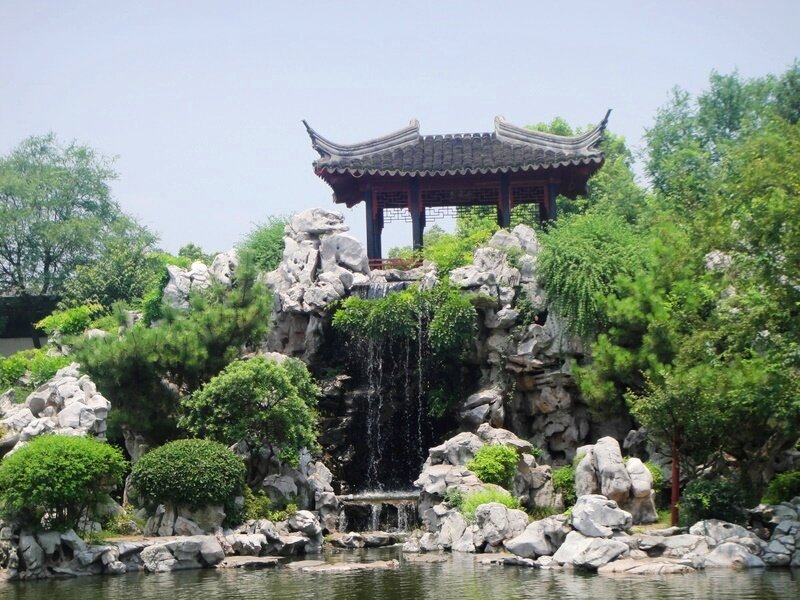 Traditional Pavilion with Waterfall