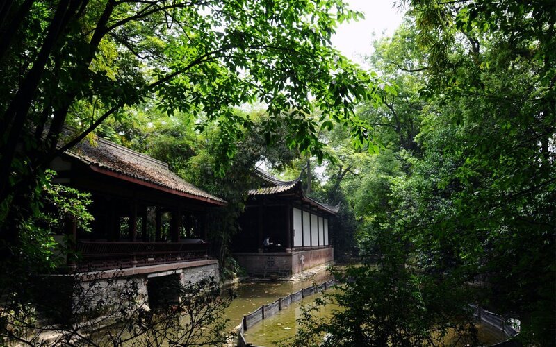 traditional pavilions in a lush garden