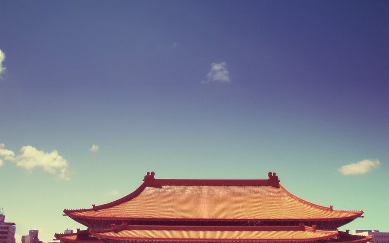 traditional roof against blue sky