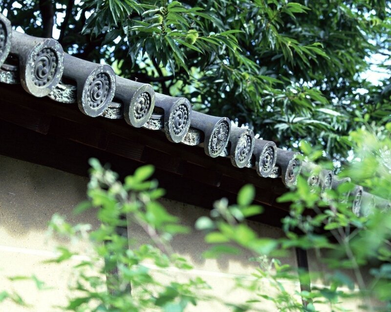 traditional roof tiles with greenery
