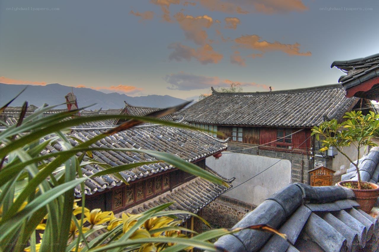 traditional rooftops at sunset