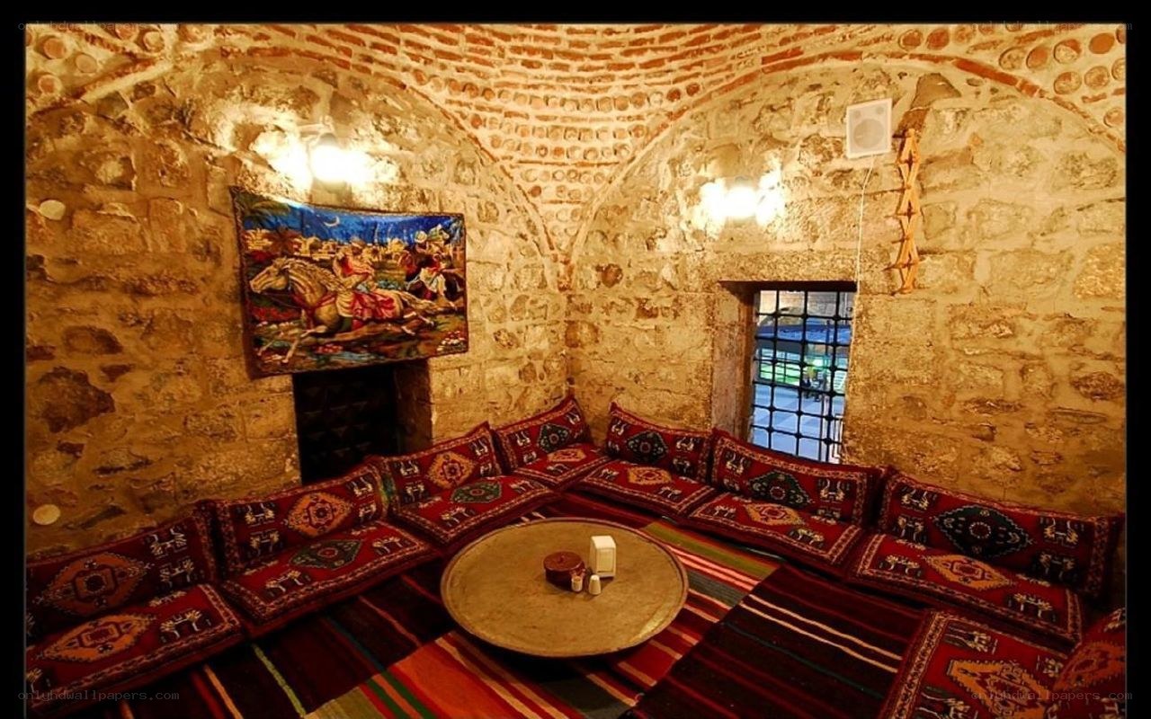 Traditional stone room with cushions