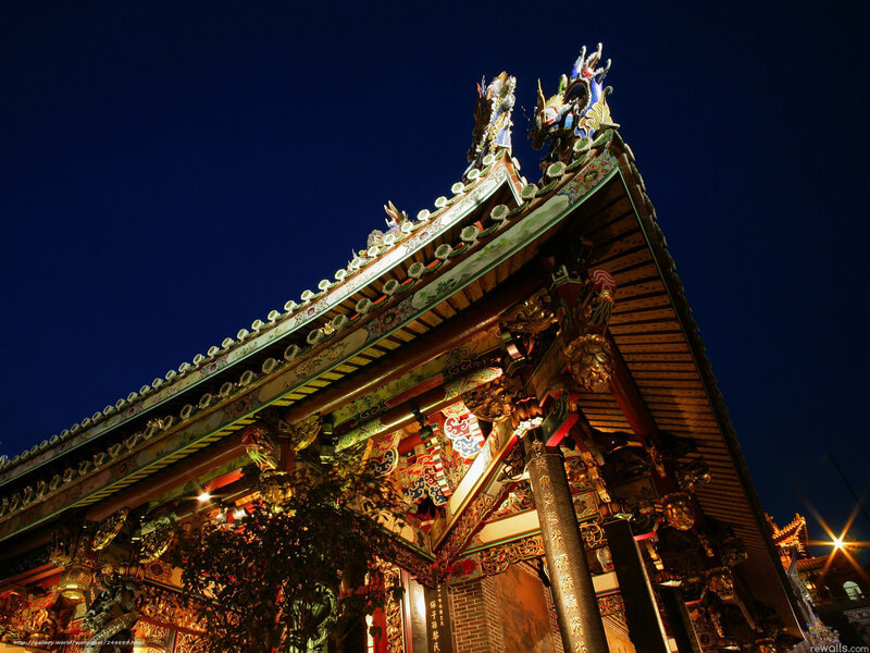 Traditional temple roof at night