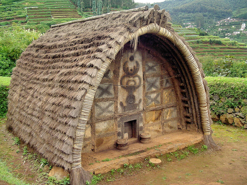 Traditional thatched hut in a hillside