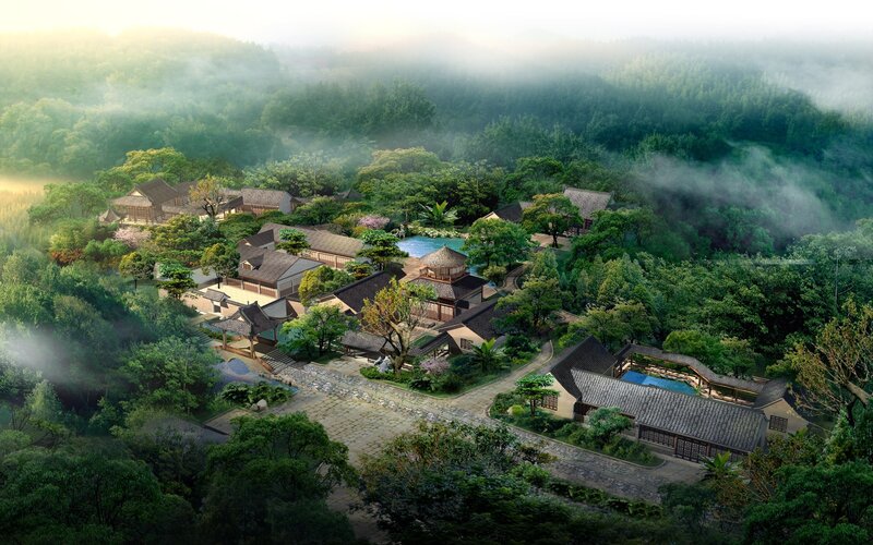 Traditional village in misty mountains