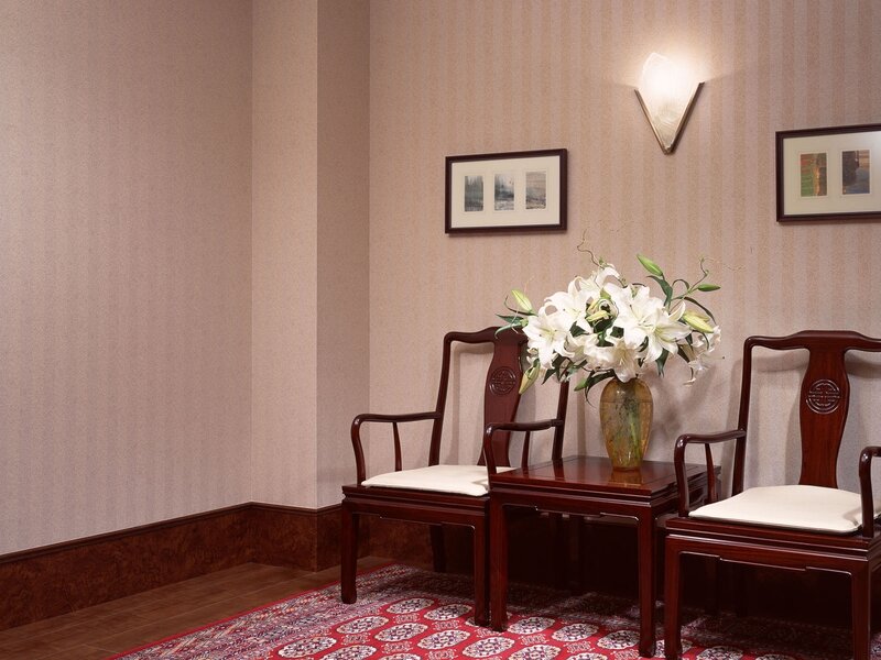 Traditional wooden chairs with flowers