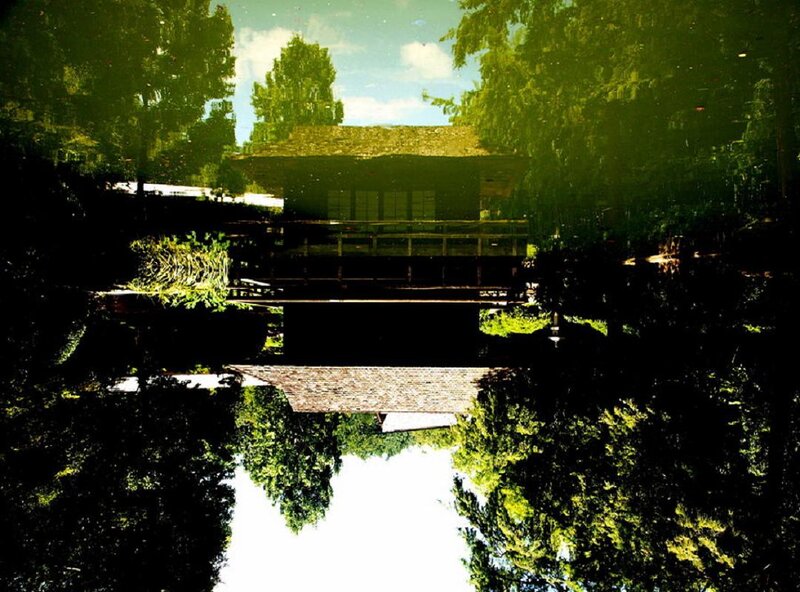 Traditional Wooden House — Green, Serene, Afternoon