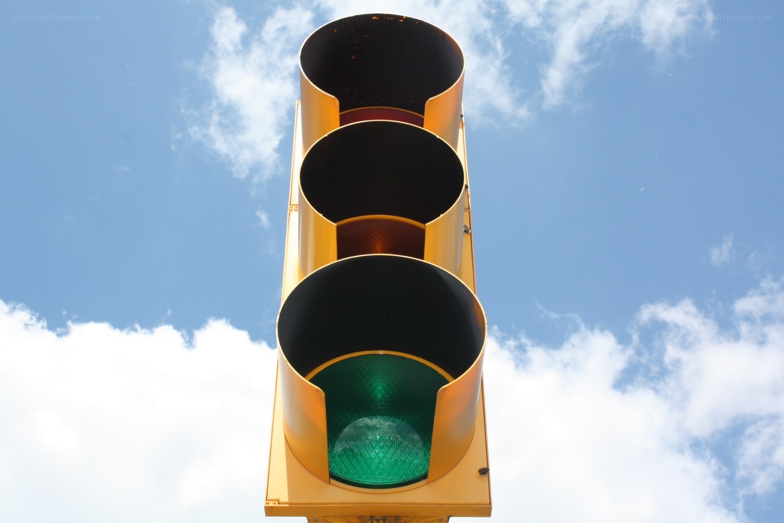 traffic light against blue sky