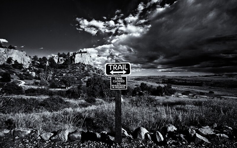 Trail closed sign in black and white