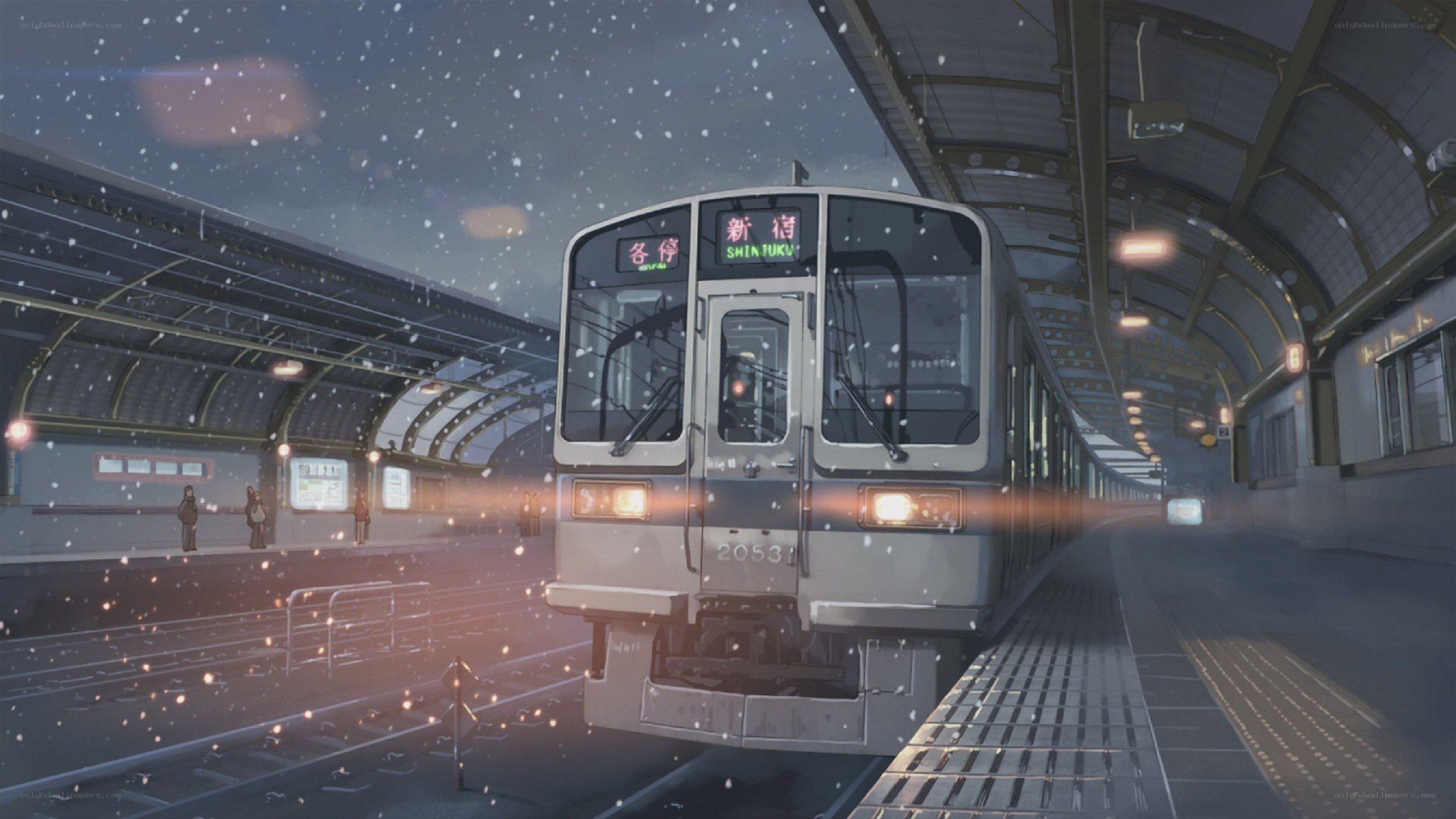 Train at a snowy station