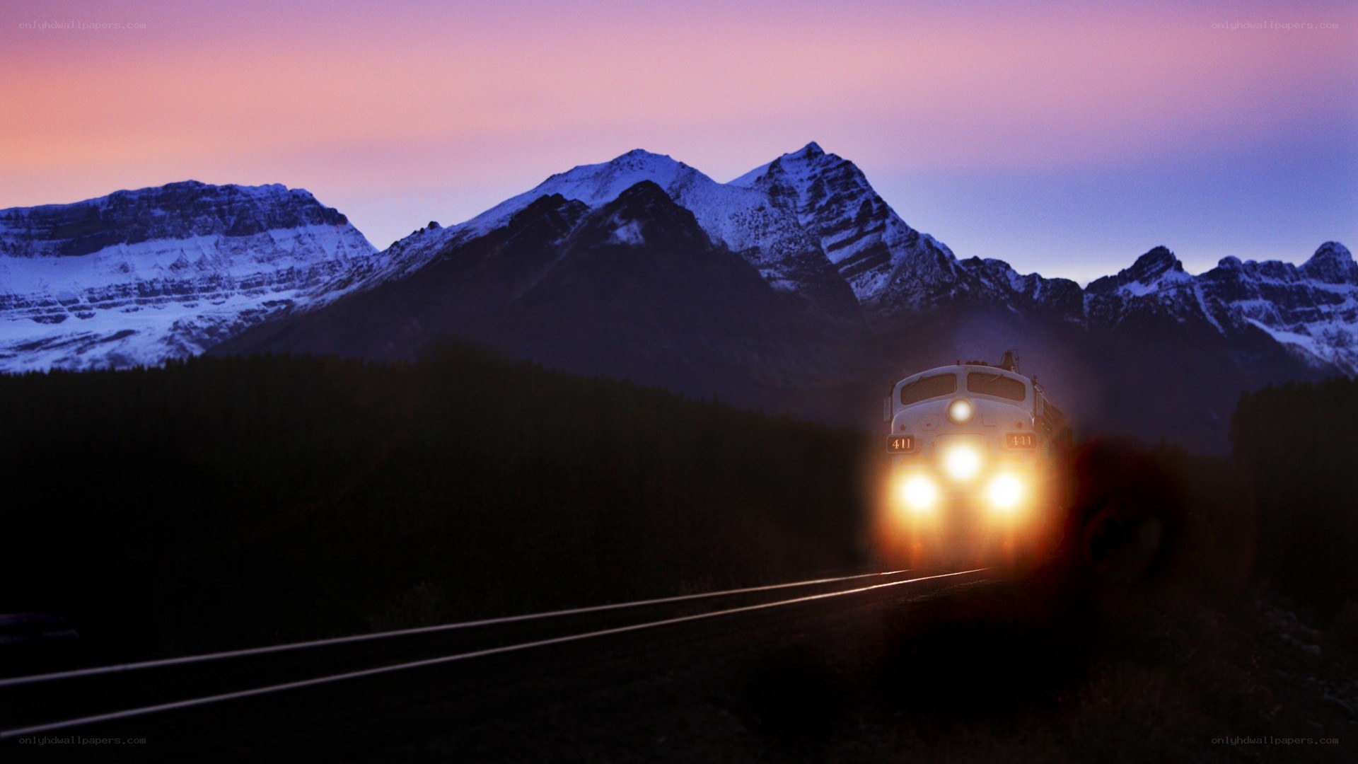 Train at dusk in the mountains