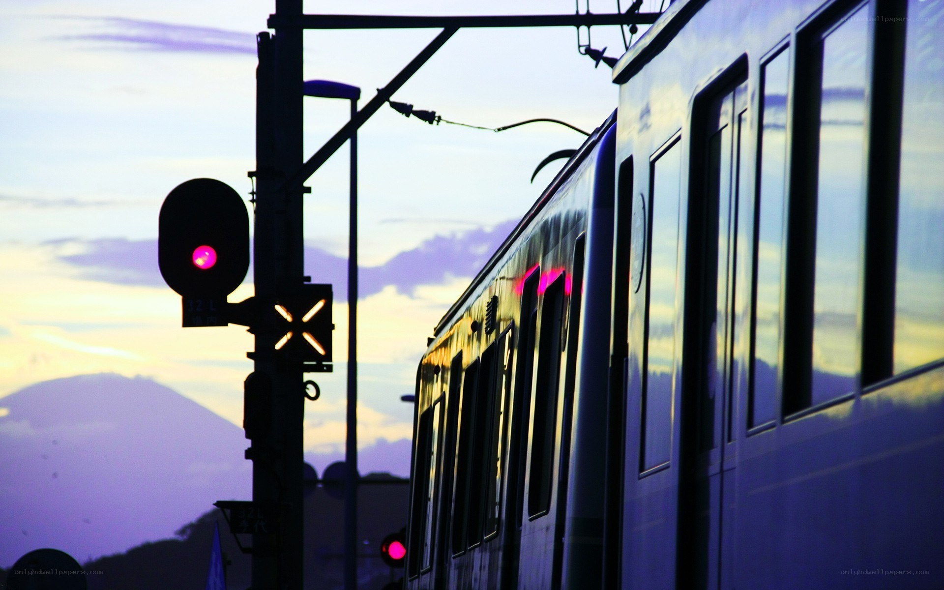 Train at dusk with signal light