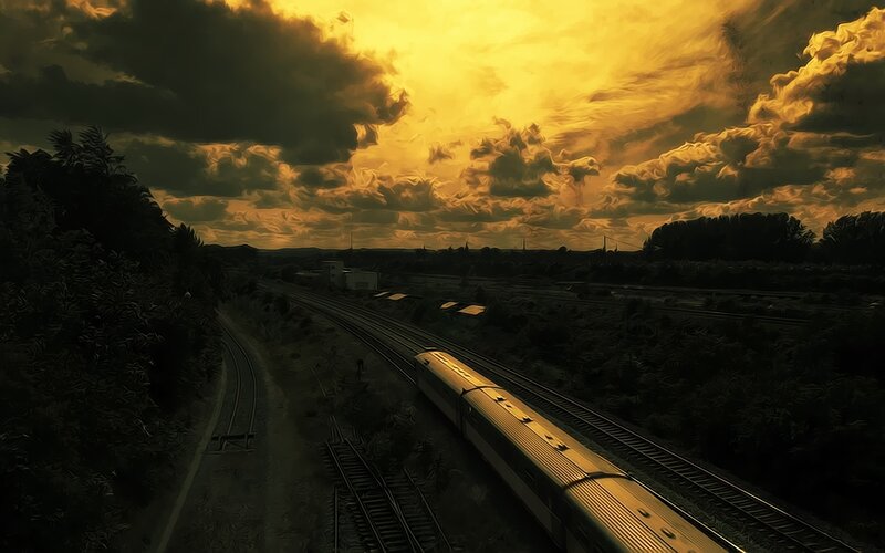 Train at golden sunset