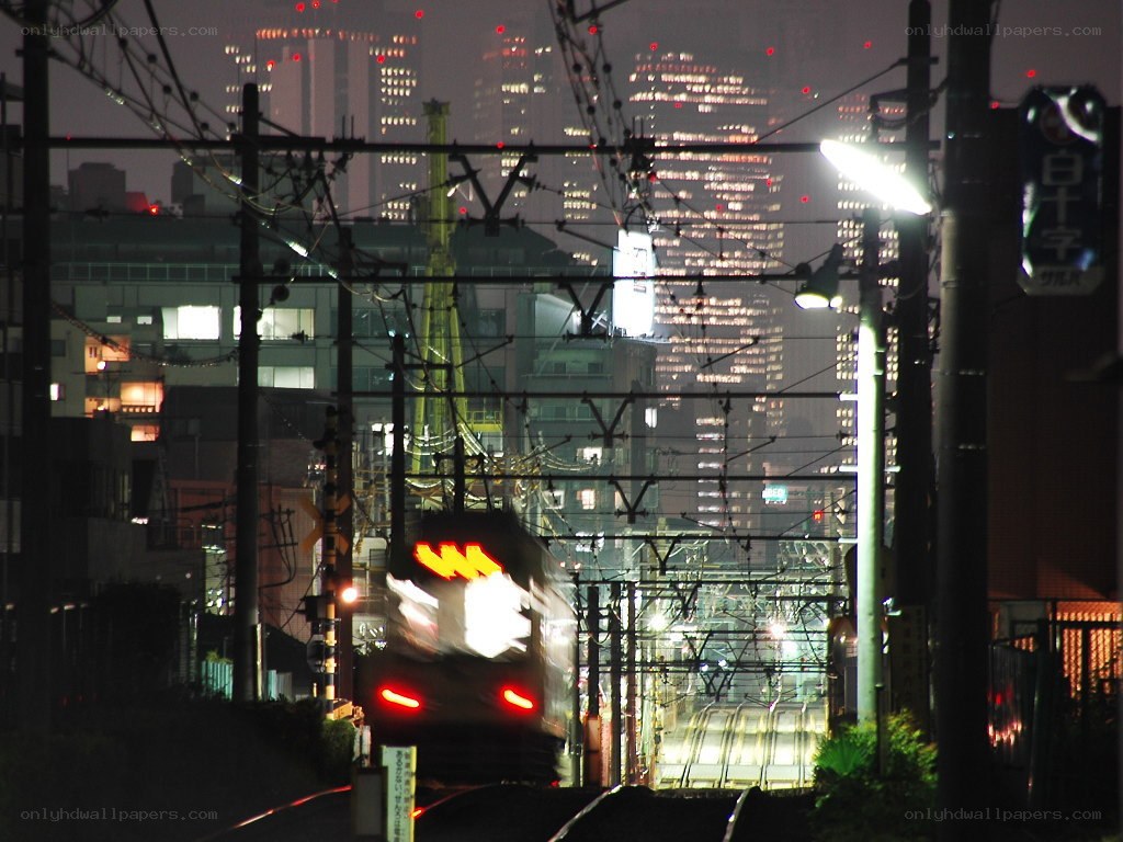 Train at night in a city