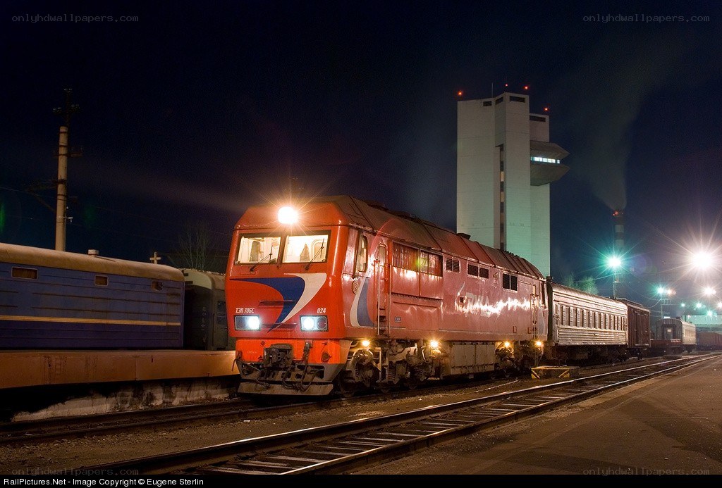 Train at night in a rail yard
