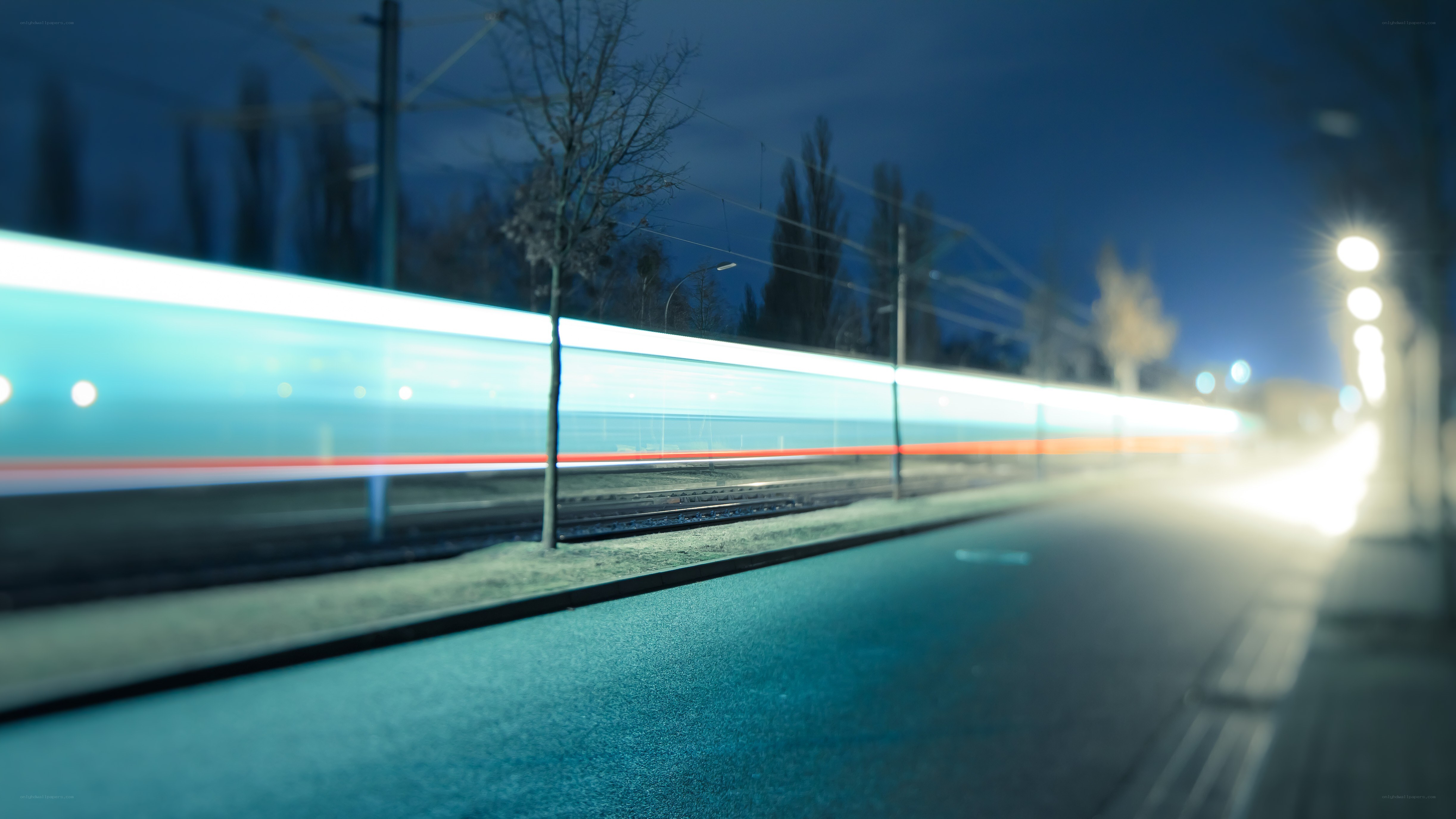 Train at night with light trails