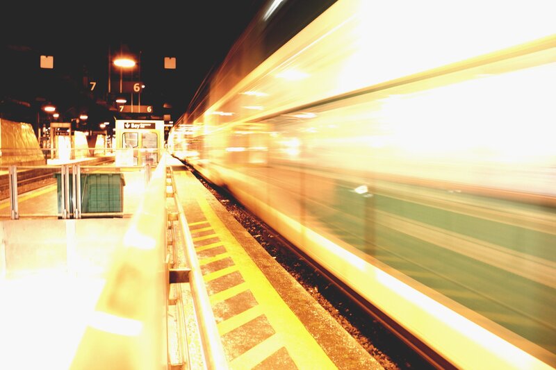 Train at Station Platform — Yellow
