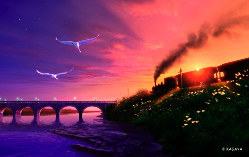 Train at sunset over a river