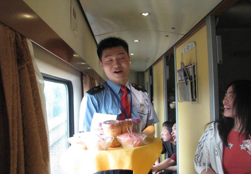 Train Attendant Serving Food