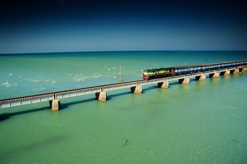 Train crossing sea bridge