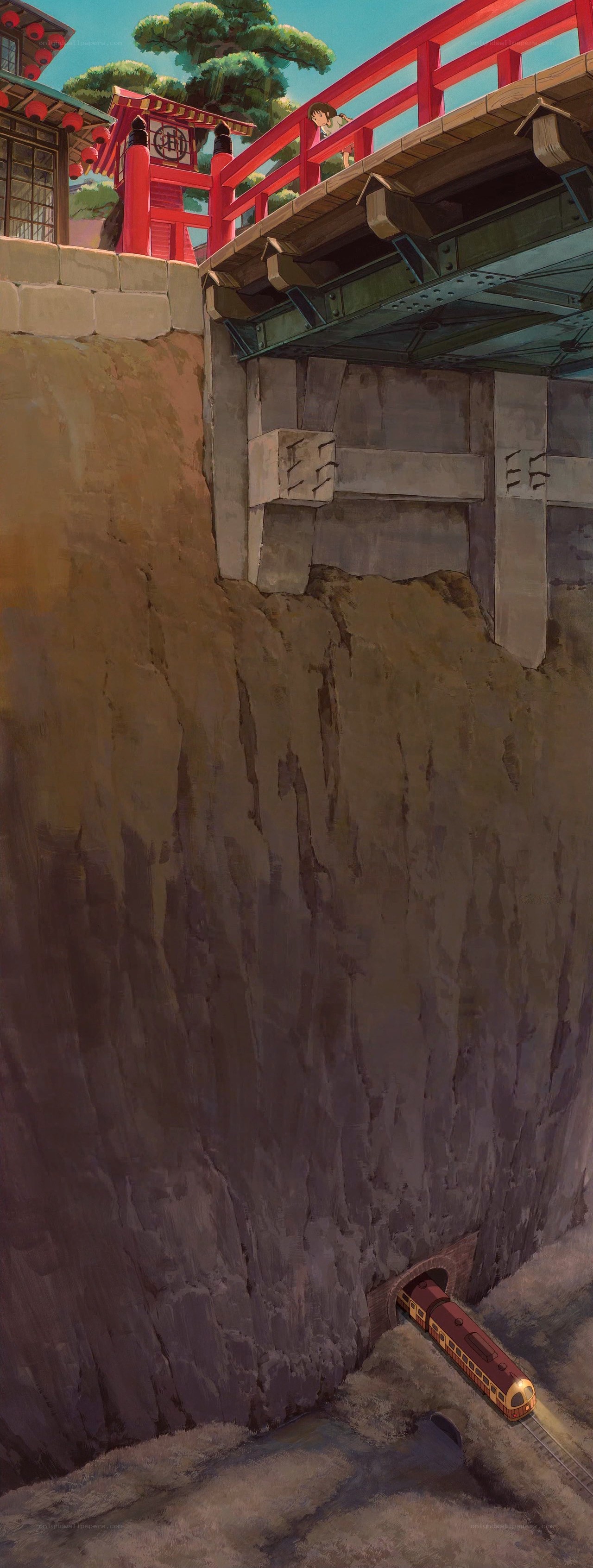 train emerging from tunnel