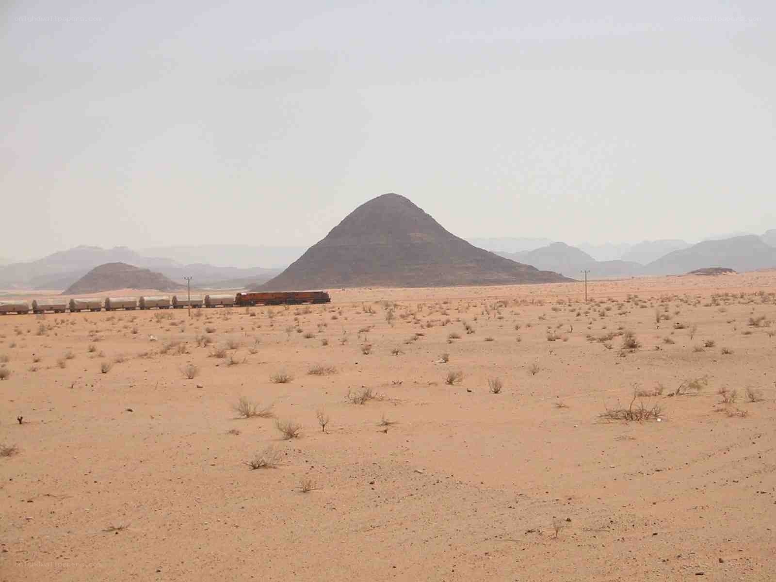 Train in desert landscape
