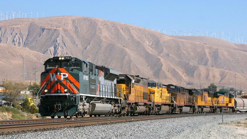Train in desert landscape