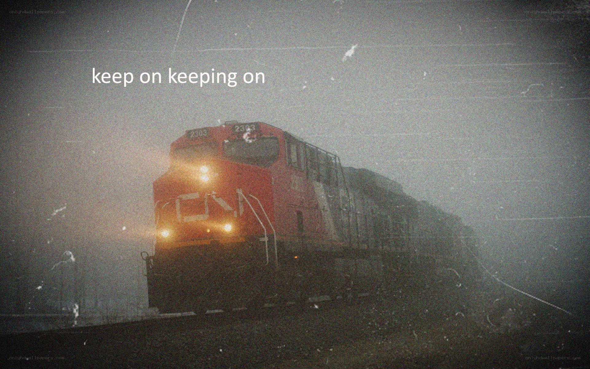train in fog with text