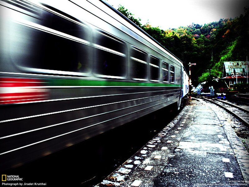 Train in motion at a station