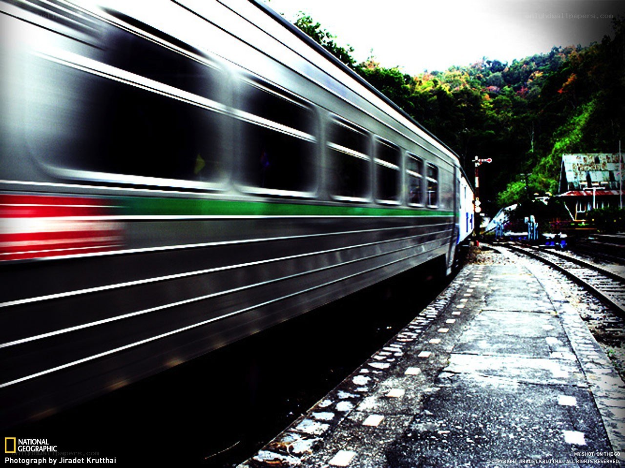 Train in motion at a station