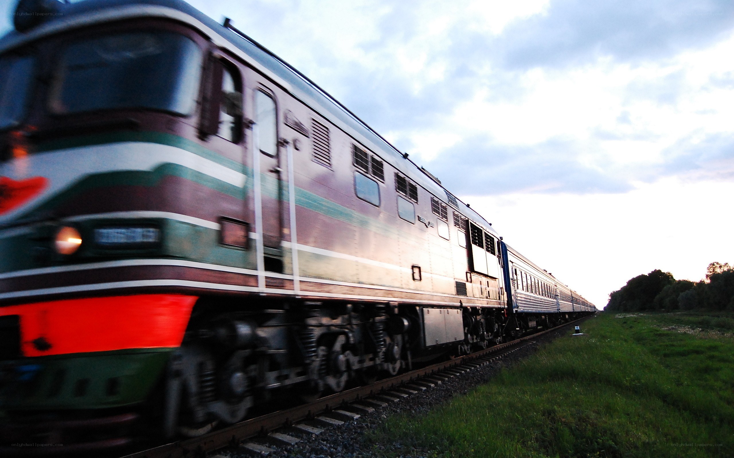 Train in motion at dusk