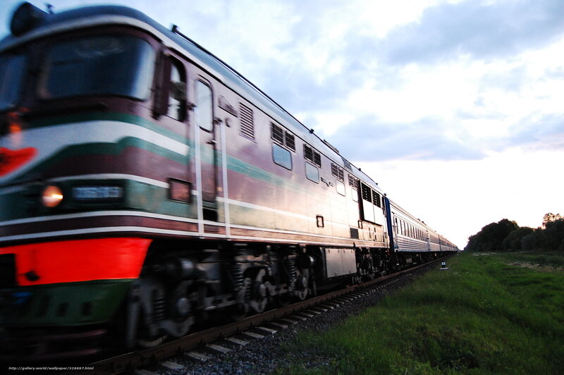 Train in motion at dusk