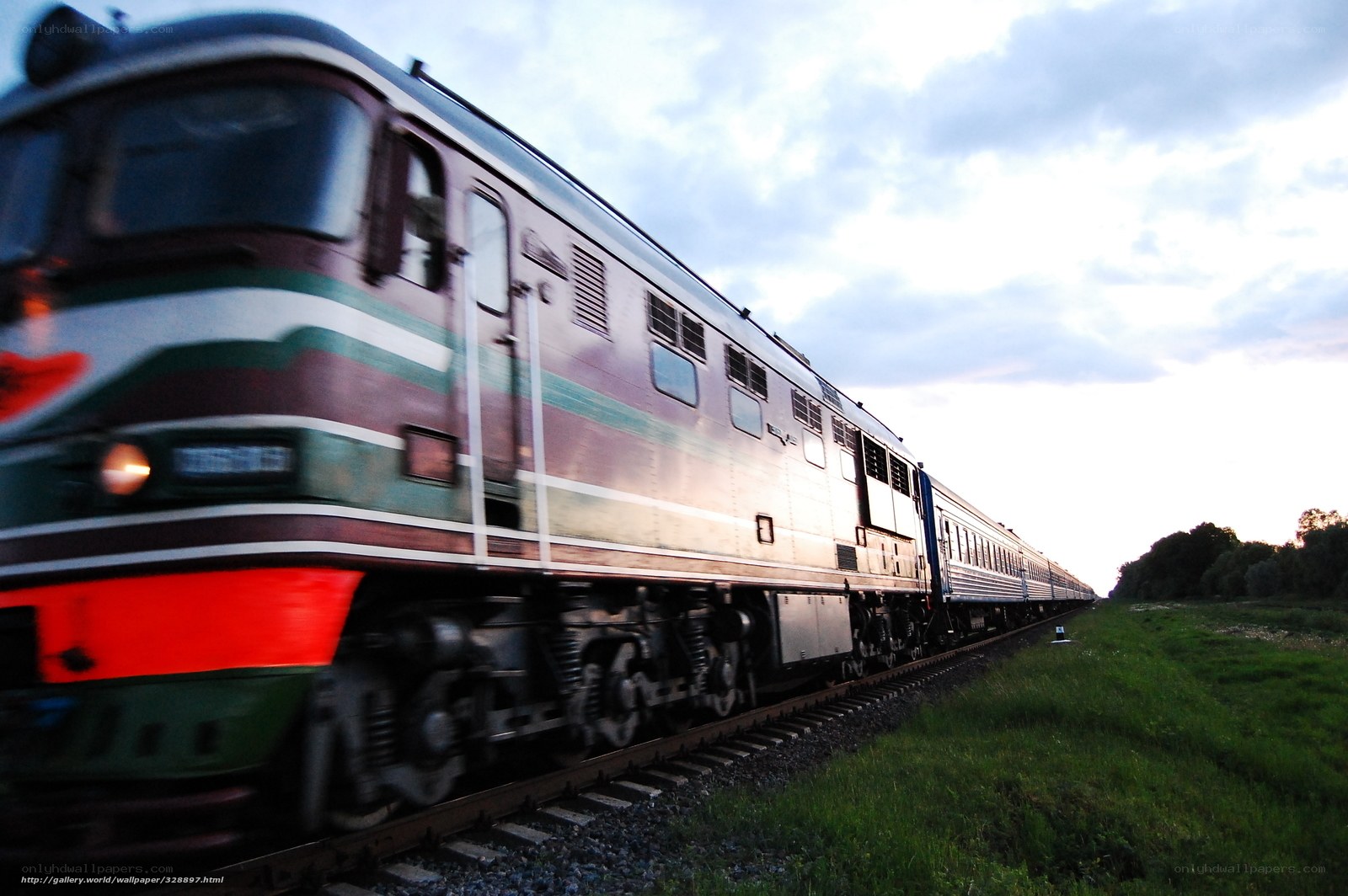 Train in motion at dusk