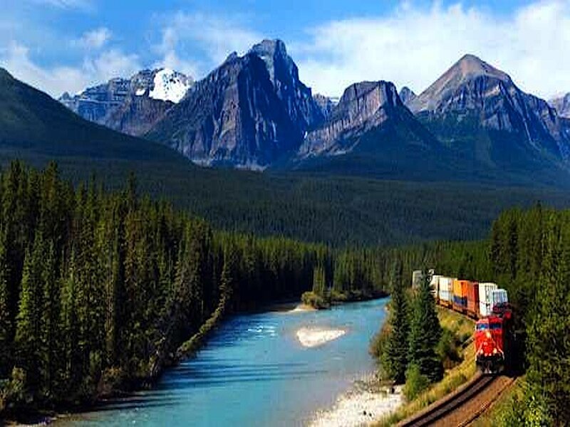 Train in Mountain Valley — Blue