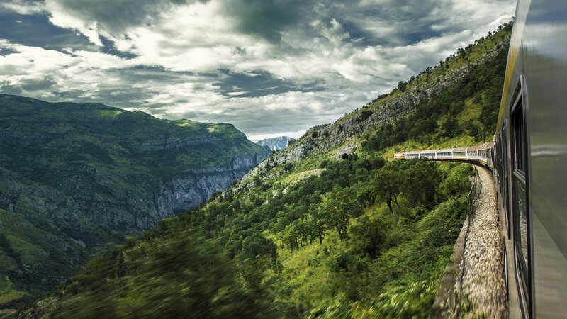 Train in Mountain Valley — Green, Dramatic