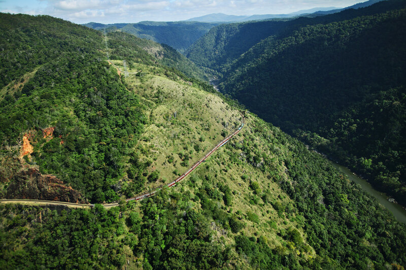 Train in Mountain Valley — Green, Serene, Afternoon