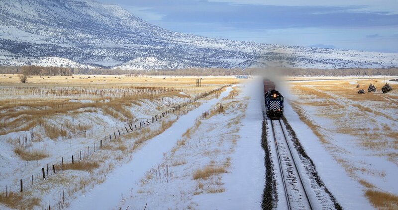 Train in Snowy Field