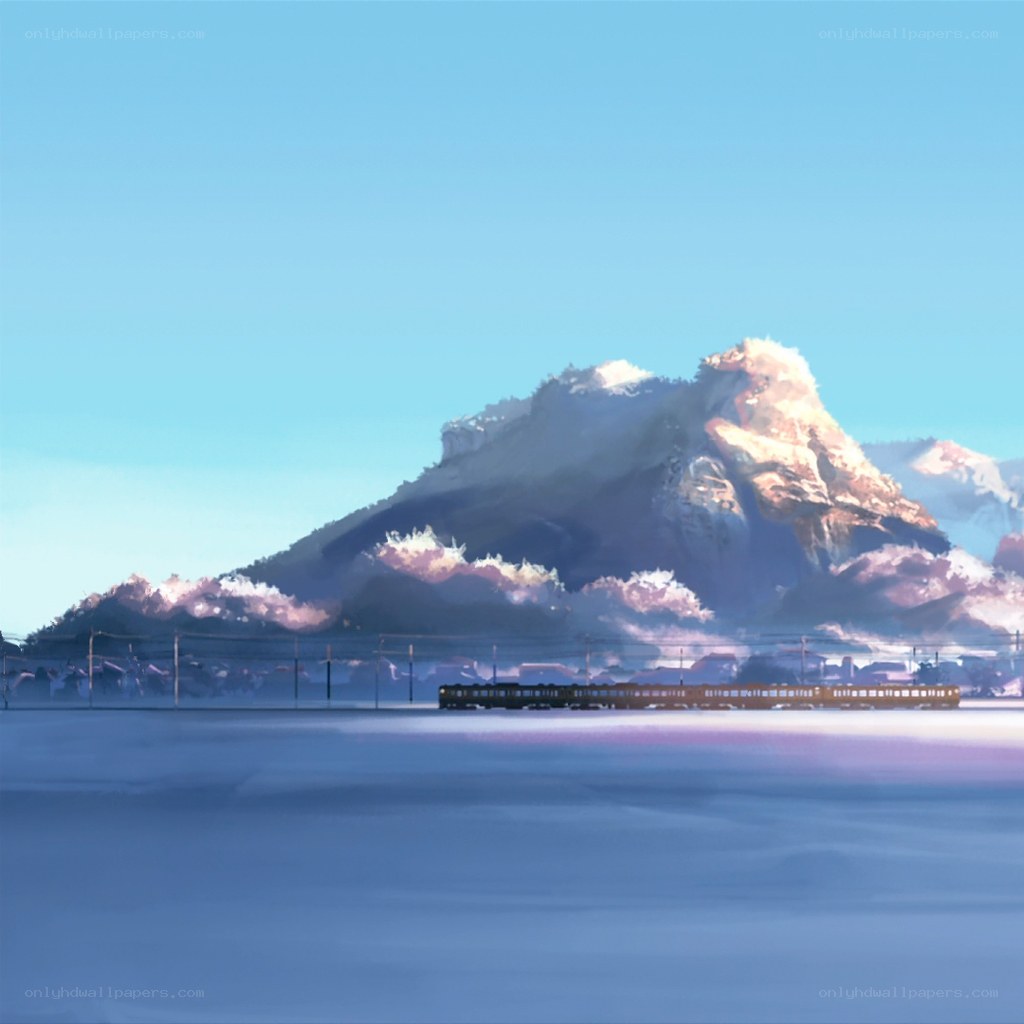 Train in snowy mountain landscape