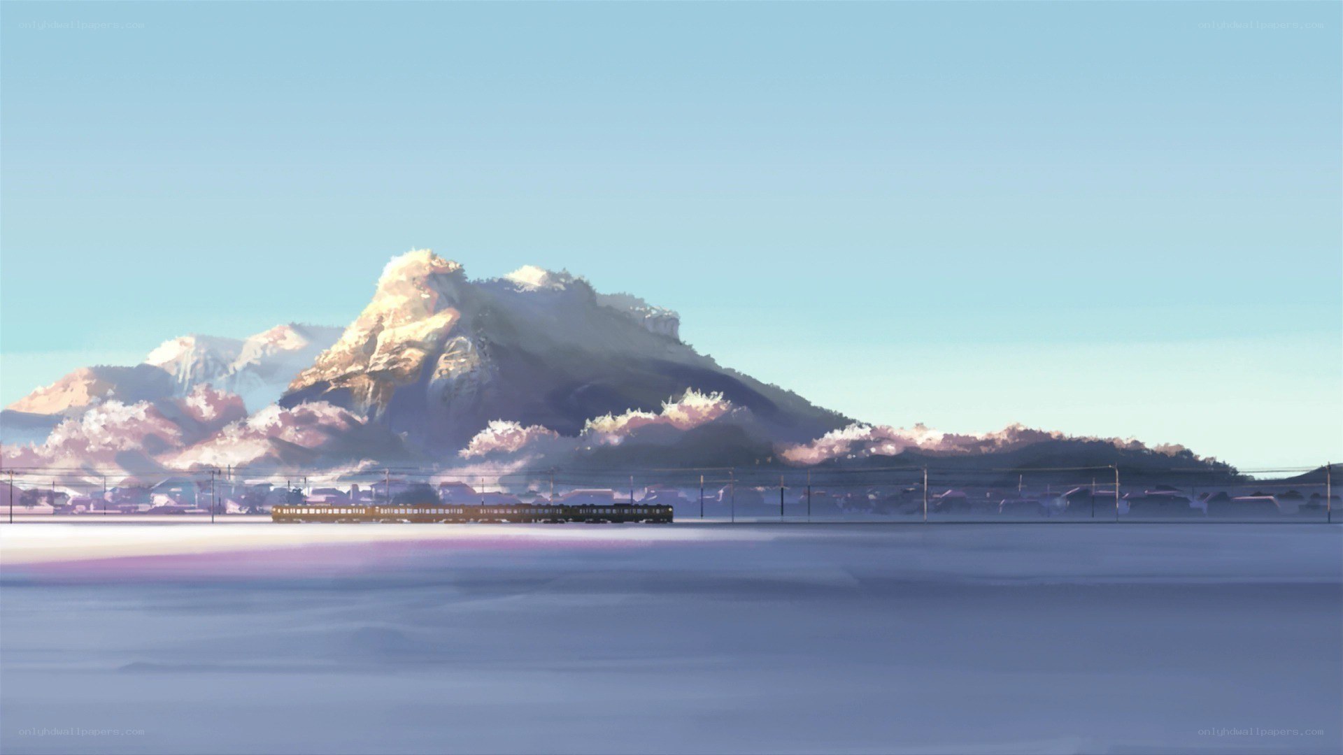 Train in snowy mountain landscape