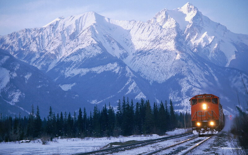 Train in snowy mountains