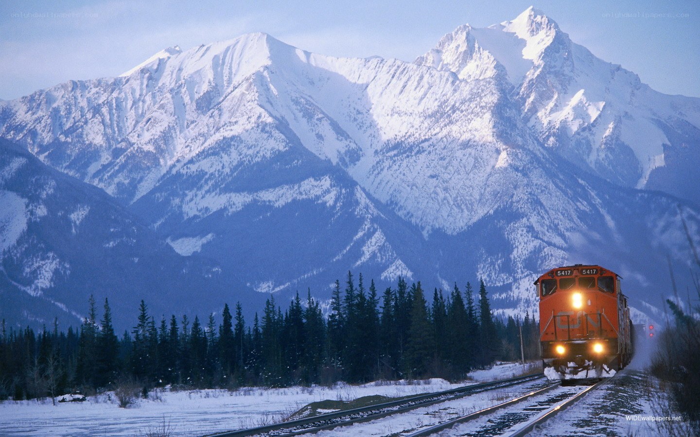 Train in snowy mountains