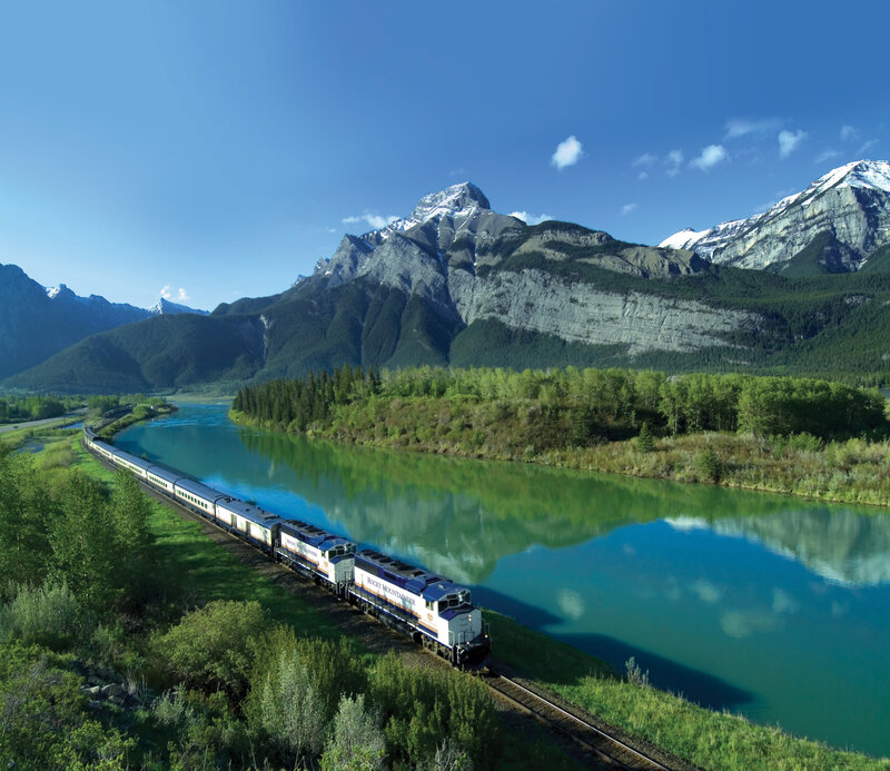 Train journey through mountain valley
