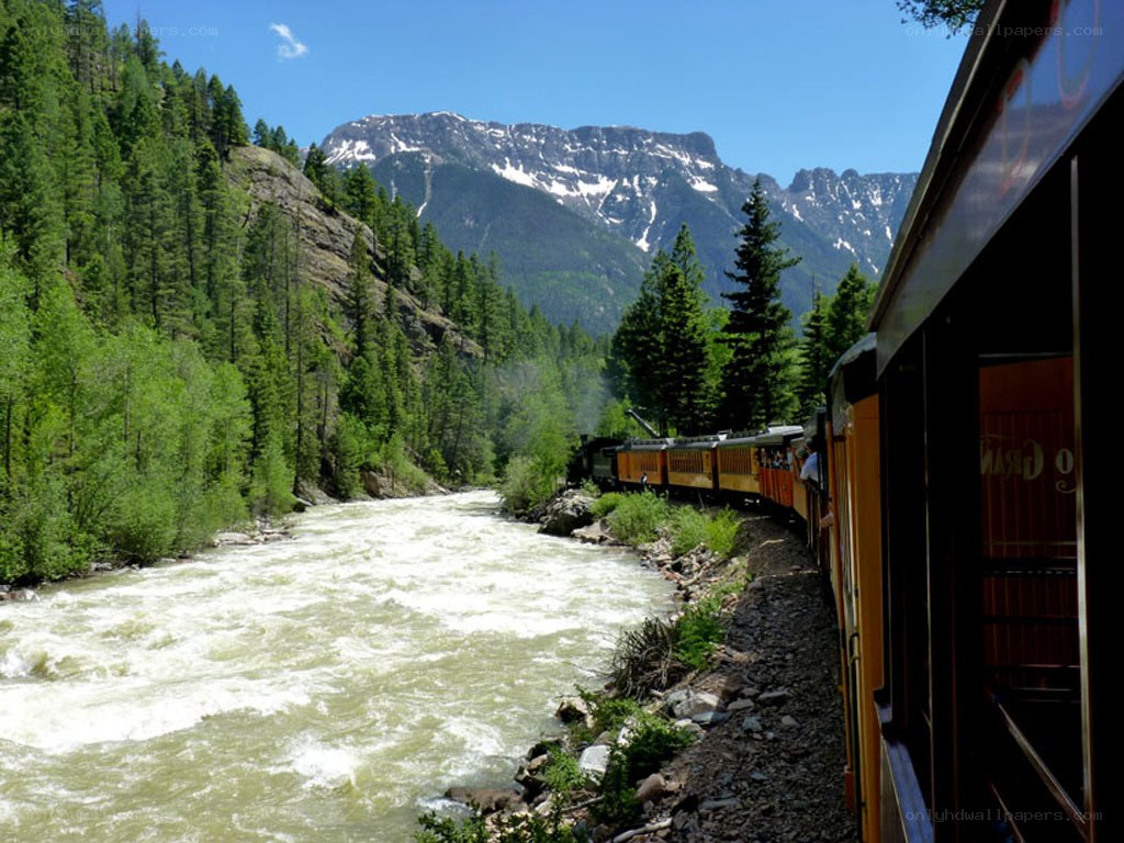 Train journey through mountain valley