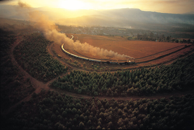Train journey through scenic valley