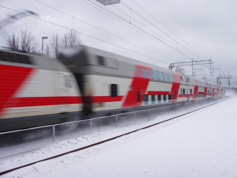 Train moving in snowy landscape