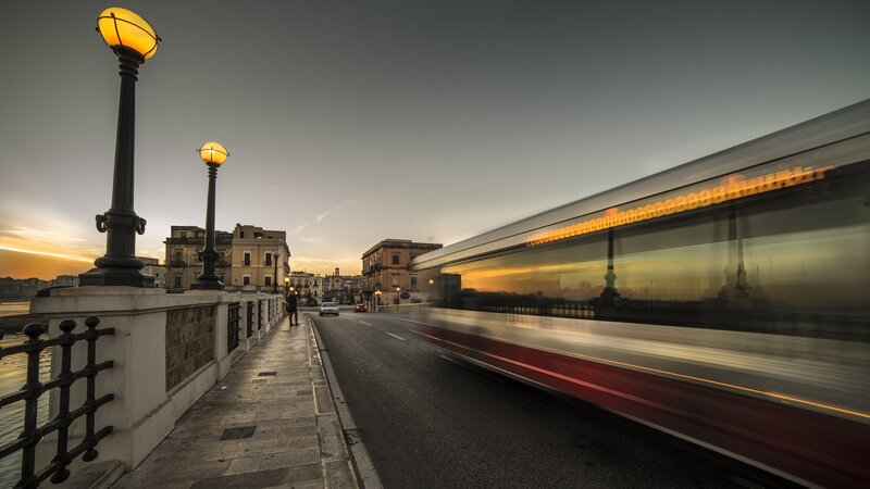 Train on a Bridge — Gray, Dramatic, Sunset