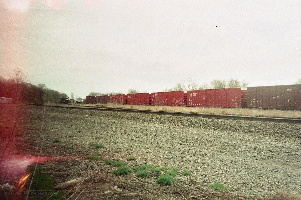 Train on a gravel track